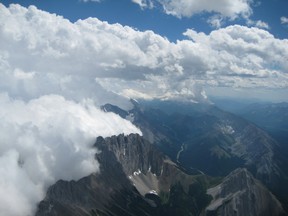 The view of the Rockies from the seat of a glider north of Cowley. (Inset) Tim Wood wins two trophies from the Alberta Soaring Council. Photos submitted