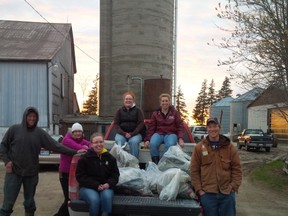 Spencer Reid, Lisa Nethercott, Becky Aikens, Samantha Klaver and (front) Jacquelyn Denham and Adam Henderson show off the end result of the clean up.