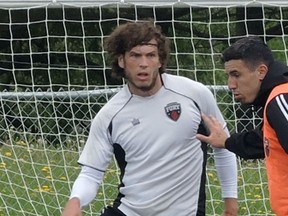 Tom Heinemann (left) practises with Fury on Thursday. He could be in the lineup Saturday. (Chris Hofley/Ottawa Sun)