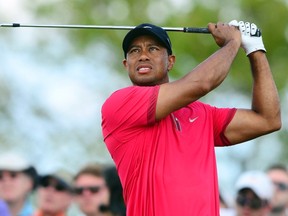 Tiger Woods tees off during the final round of the WGC Cadillac Championship at Trump National Doral in this file photo taken in Miami, Florida March 9, 2014. (REUTERS/Andrew Weber/USA TODAY Sports/Files)