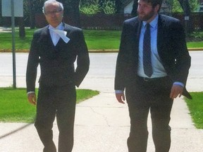Jeff Gindin and Jesse Thorn-Finch, lawyers for Christopher Shewchuk, walk into Dauphin court May 28, 2014. (DEAN PRITCHARD/Winnipeg Sun)