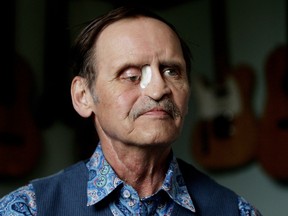 Cancer surgeries have left David Whenham with a hole in his face. (David Bloom/Edmonton Sun)