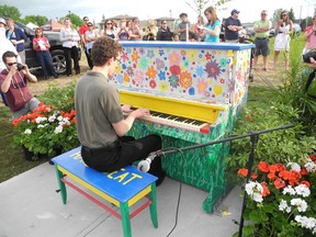London's new outdoor piano, described as a playable piece of art, was unveiled Wednesday in Hyde Park. DAN BROWN / THE LONDON FREE PRESS / QMI AGENCY