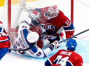 The Rangers' Chris Kreider slams into Habs goalie Carey Price in the Eastern Conference final. (USA Today Sports)