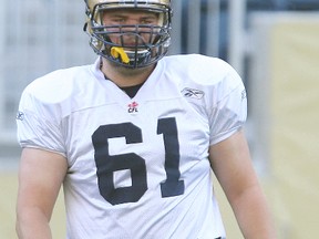 Winnipeg Blue Bombers offensive lineman Matthias Goossen carries the ball during CFL practice in Winnipeg, Man. Wednesday May 28, 2014.
Brian Donogh/Winnipeg Sun/QMI Agency