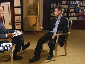 "NBC Nightly News" anchor and managing editor Brian Williams (L) sits during an interview with former U.S. defense contractor Edward Snowden in Moscow in this undated handout photo released by NBC News May 28, 2014.   
REUTERS/NBC News/Handout via Reuters