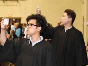 JOHN LAPPA/THE SUDBURY STAR/QMI AGENCY 
More than 200 graduating students from the School of Business and Information Technology and Hanson International Academy of Toronto, attended convocation ceremonies at Cambrian College in Sudbury, ON. on Wednesday, May 28, 2014. The afternoon ceremony is one of six convocations being held at the Barrydowne campus.