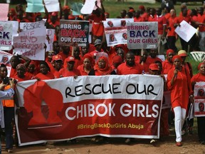 The Abuja wing of the "Bring Back Our Girls" protest group march to the presidential villa to deliver a protest letter to Nigeria's President Goodluck Jonathan in Abuja, calling for the release of the Nigerian schoolgirls in Chibok who were kidnapped by Islamist militant group Boko Haram, May 22, 2014. REUTERS/Afolabi Sotunde