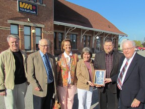 Members of Rail Advocacy in Lambton (RAIL,) a group lobbying for improved passenger rail service in Sarnia-Lambton, received Lambton County Warden Todd Case's Citizen of the Month award for May. At the presentation, held outside Sarnia's Via station are, from left, Sarnia Mayor Mike Bradley, RAIL members Ed Banninga, Eileen Viola and Mabel Higgins, Case and RAIL member Jim Houston. (PAUL MORDEN, The Observer)