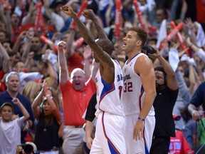 Clippers guard Jamal Crawford (11) and forward Blake Griffin (32) celebrate during second round NBA playoff action against the Thunder in Los Angeles in early May. (Kirby Lee/USA TODAY Sports)