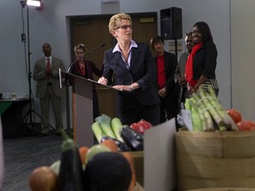 Premier Kathleen Wynne's campaign tour rolled in to Centennial Colleges Culinary Management International Program on Thursday. (JACK BOLAND/Toronto Sun)