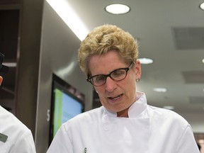 Ontario Premier Kathleen Wynne is pictured Tuesday at a campaign stop at Centennial College's culinary management international program. (JACK BOLAND, Toronto Sun)