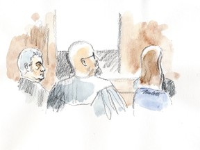 London Mayor Joe Fontana, right, seated with members of his defence team, listens Monday as his trial begins in London, Ont., on charges of fraud, breach of trust and uttering forced documents. (Guy Nicoletti, Special to QMI Agency)