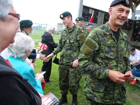 Canadian Forces members preparing for overseas deployment receive Tim Hortons gift cards from members of the ROSE Volunteers. The tradition started in 2006 with troops in Afghanistan and continues with those going overseas on smaller missions. ELLIOT FERGUSON/THE WHIG-STANDARD