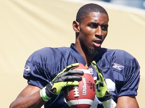 Winnipeg Blue Bombers defensive end Kenny Tate handles the ball during CFL football practice in Winnipeg, Man. Thursday May 29, 2014.
Brian Donogh/Winnipeg Sun/QMI Agency