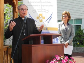 Star Staff
Bishop Jean-Louis Plouffe addresses a crowd at the fifth anniversary celebration of St. Joseph's Continuing Care Centre last week, along with president and CEO Jo-Anne Palkovits.