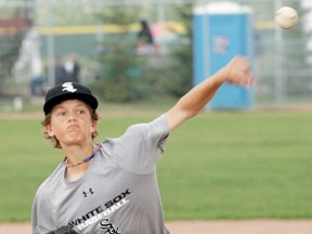 Adam Macko of the Spruce Grove bantam Triple A Whitesox lets one fly during a practice session. He also does double duty as a first baseman. - Gord Montgomery, Reporter/Examiner