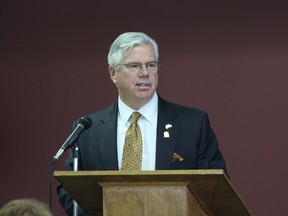 Angus Watt, managing director of individual investor services for National Bank Financial presents a 2014 economic forecast to business owners at the Stony Plain Golf Course on May 21. - Karen Haynes, Reporter/Examiner