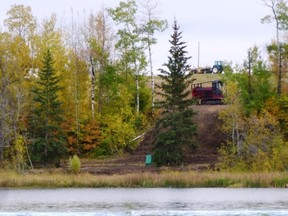 Development cut through the tree-line at Jackfish Lake. The developer and the County are now at odds over reclamation. - File Photo
