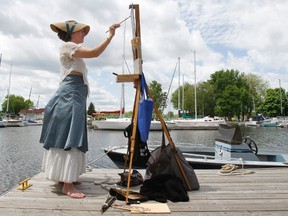 Chantelle Dinkel, a Swiss and Canadian classical realist painter, is seen at work at Victoria Harbour Friday morning May 30, 2014. - JEROME LESSARD/THE INTELLIGENCER