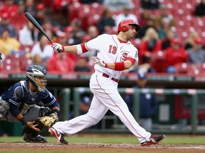 Joey Votto of the Cincinnati Reds strikes out in the third inning during the second game of a doubleheader against the San Diego Padres at Great American Ball Park on May 15, 2014 in Cincinnati, Ohio. (Andy Lyons/Getty Images/AFP)