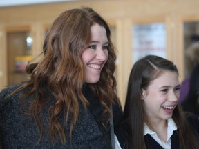 Clara Hughes poses with Regiopolis-Notre Dame students during a visit to the school in 2013. (Ian MacAlpine/The Whig-Standard)