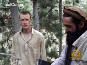 This still image provided on December 7, 2010 by IntelCenter shows the Taliban associated video production group Manba al-Jihad December 7, 2010 release of US Sergeant Bowe Bergdahl (L), who has been held hostage by the Taliban since his disappearance on June 30, 2009.