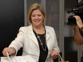 Ontario NDP Leader Andrea Horwath casts her vote at an advance poll in her Hamilton riding on May 31, 2014. (Shawn Jeffords/Toronto Sun)