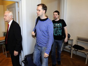Fredrik Neij (R) and Peter Sunde (C), two co-founders of the file-sharing website, The Pirate Bay, arrive at the Swedish Appeal Court in Stockholm.

REUTERS/Anders Wilklund/Scanpix