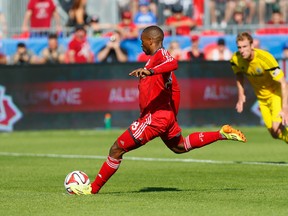 Jermain Defoe scored twice and Doneil Henry notched the winner as the Reds beat Columbus, 3-2, on Saturday at BMO Field. (REUTERS)