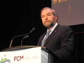 NDP federal leader Tom Mulcair speaks in 2014 at the annual conference of the Federation of Canadian Municipalities. (File photo)