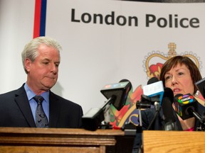 London police inspector Kevin Heslop and Children's Aid Society executive director Jane Fitzgerald speak about the rescue of a 10-year-old boy held captive for 18-24 months in London, Ont. on Friday May 30, 2014.DEREK RUTTAN/ The London Free Press /QMI AGENCY