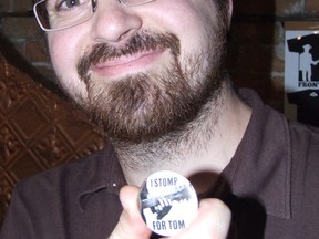 Harold Carmichael/The Sudbury Star
Sculptor Tyler Fauvelle holds up the first of six fundraising buttons with the Stompin' Tom Connors statue campaign.