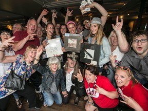 Contest winners at the launch party for the release of remastered Led Zeppelin I, II, III at the Hard Rock Cafe in Toronto on Sunday, June 1, 2014. (Craig Robertson/Toronto Sun)