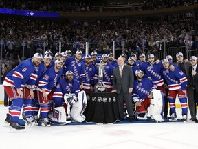 The New York Rangers pose with the Prince of Whales Trophy after beating the Montreal Canadiens 1-0 in game six of the Eastern Conference Final of the 2014 Stanley Cup Playoffs at Madison Square Garden. (Adam Hunger-USA TODAY Sports)