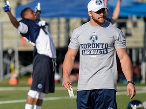 Chad Kackert checks things out on the opening day of the Argos training camp yesterday at York University. Rather than sit on IR while his leg injury from last year heals, he has become the team’s strength and conditioning coach. (ANDREW LAHODYNSKYJ/Photo)