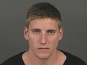 Jack Elway is seen in a mugshot shortly after being charged with assault.