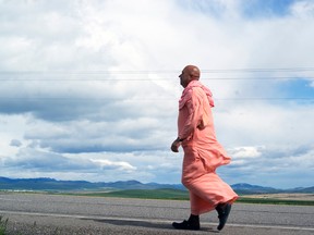 Bhaktimagra Swami walks west of Pincher Creek headed toward peace of mind and British Columbia. Greg Cowan photo/QMI Agency.