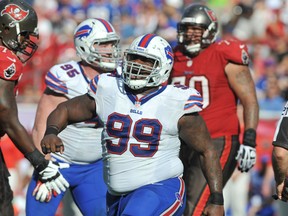 Defensive tackle Marcell Dareus #99 of the Buffalo Bills celebrates after a sack against the Tampa Bay Buccaneers December 8, 2013 at Raymond James Stadium in Tampa, Florida. (Al Messerschmidt/Getty Images/AFP)