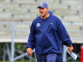 Scott Milanovich fires up the team during Argos training camp at York University  in Toronto, Ont. on Tuesday June 3, 2014. Dave Abel/Toronto Sun/QMI Agency