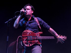 INDIO, CA - APRIL 12: Musician Isaac Brock of the band Modest Mouse performs onstage during day 1 of the 2013 Coachella Valley Music & Arts Festival at the Empire Polo Club on April 12, 2013 in Indio, California.   Kevin Winter/Getty Images for Coachella/AFP