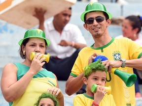 Brazilian supporters wait for the start of a friendly football match between Brazil and Panama at Serra Dourada Stadium in Goiania, Goias State, Brazil on June 3, 2014. (AFP PHOTO/Evaristo SA)