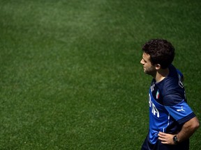 Italy's forward Giuseppe Rossi looks on during the first Italy's national football team training session at Florence's Coverciano training ground on May 20, 2014. (AFP/PHOTO Filippo MONTEFORTE)