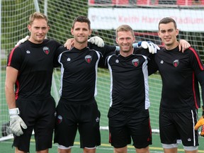 After announcing his resignation from Ottawa Fury FC Tuesday, goalkeeper coach David Bellemare (second from right) poses for a photo with the squad's goalies Marcel DeBellis, Devala Gorrick and Chad Bush. (Chris Hofley/Ottawa Sun)