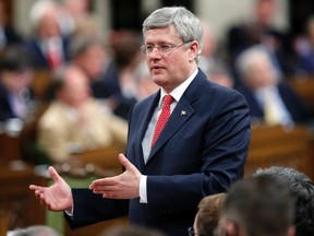 Prime Minister Stephen Harper speaks during Question Period on Parliament Hill in Ottawa June 2, 2014. (REUTERS/Blair Gable)