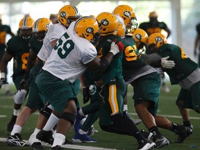 Eskimos players are saying this year's O-line is bigger and more physical than last year's. (Ian Kucerak, Edmonton Sun)