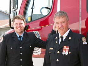 Phil Graul (right) and his son Joe served five months together on the West Perth fire department, just the second such combination in the history of the West Perth and, prior to, the Mitchell fire department. The older Graul recently retired after 32 years. SHELBY ZAKOOR PHOTO