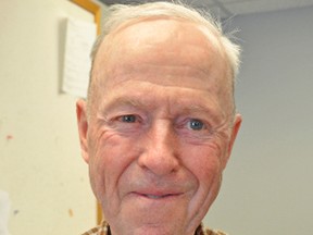 Jim Wright, nephew of former Mitchell veteran Clarence Homuth, holds a photo of his uncle in uniform prior to his departure overseas at the start of World War II in 1939. Homuth was one of 359 Canadian soldiers killed in battle on D-Day, June 6, 1944, who are being recognized with a special tribute marker in Normandy this Friday, June 6. KRISTINE JEAN/MITCHELL ADVOCATE