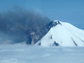 Smoke pours from the erupting Pavlof Volcano on the Alaska Peninsula, 590 miles (950 kms) southwest of Anchorage, in this picture from the Alaska Department of Fish and Game taken May 30, 2014. (REUTERS/Paul Horn/Alaska Department of Fish and Game/Handout via Reuters)