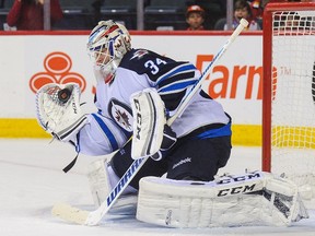 Michael Hutchinson has put up ridiculously good numbers while playing in three leagues this season and leading the IceCaps to the Calder Cup final.